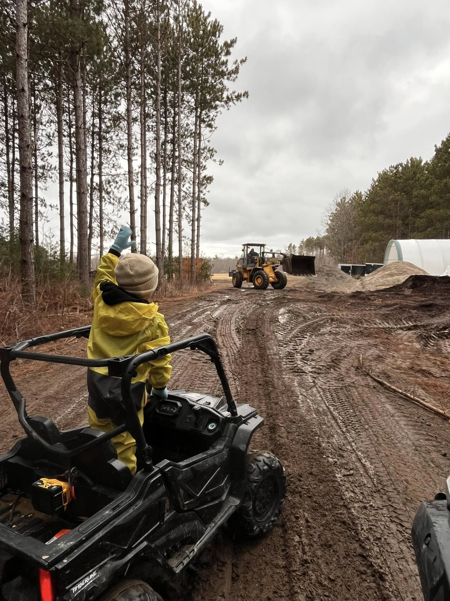Loader on muddy site
